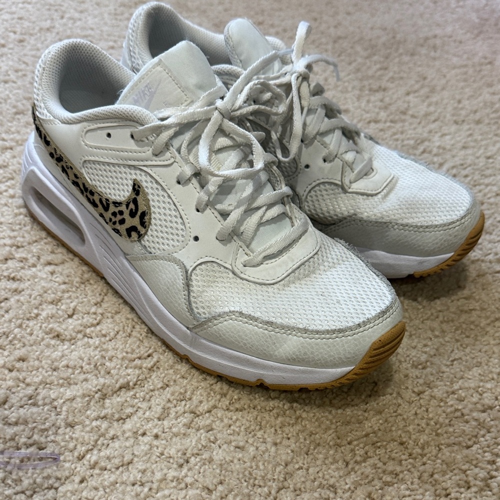 Nike Women’s White Athletic Sneakers with Leopard-Print Swoosh